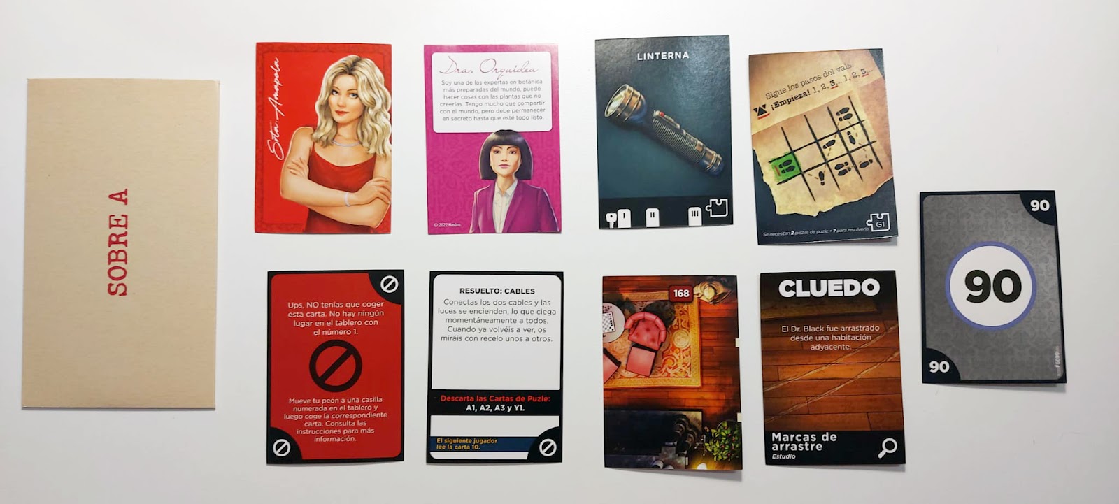 LJEM: Trilogía Cluedo Escape (Hasbro) Hay variedad en los tipos de cartas, por eso hay que tener claro qué es lo que nos dice cada una.